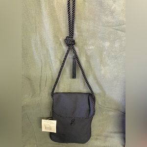 Kenneth Cole “Evening Treasure” black purse with braided rope strap.